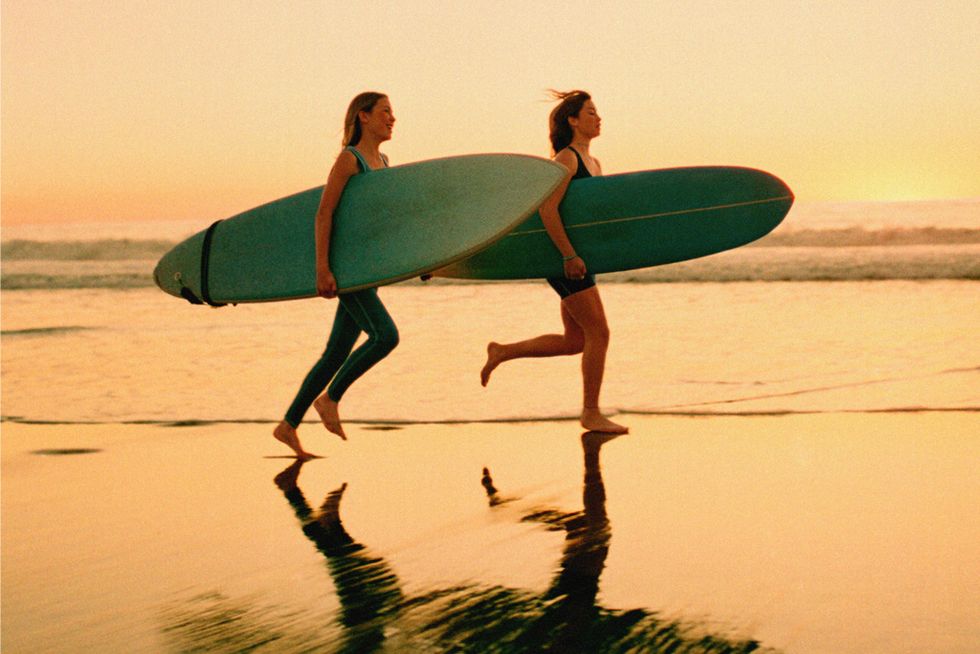 Human, Surfing Equipment, Surfboard, Fun, Standing, People in nature, Surface water sports, Vacation, Boardsport, Beach, 