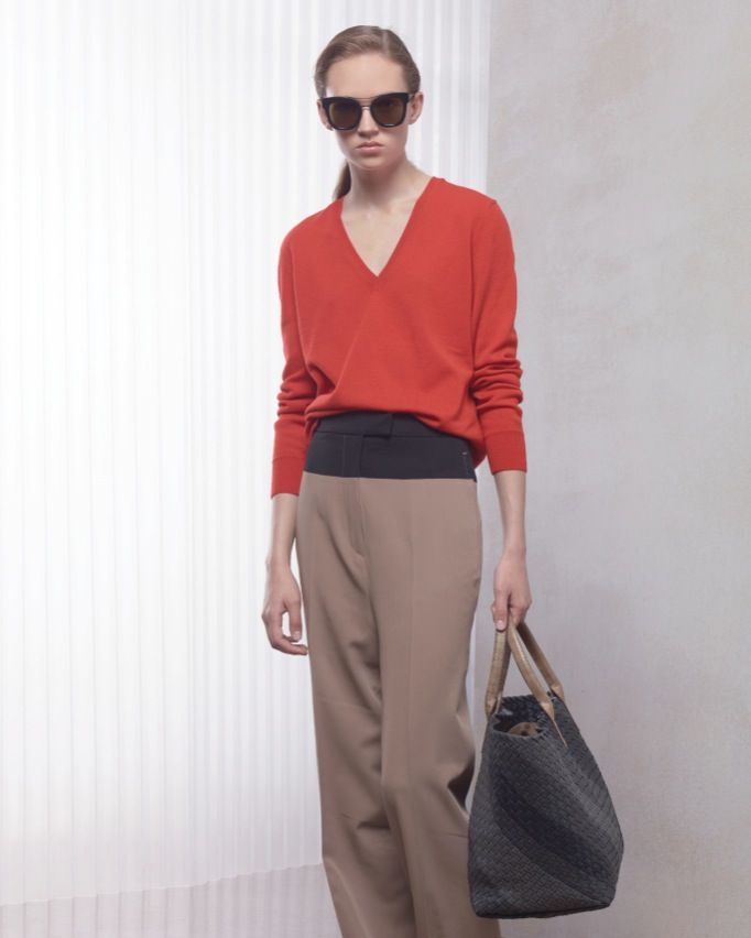 Clothing, Eyewear, Brown, Sleeve, Shoulder, Textile, Joint, Outerwear, Standing, Bag, 
