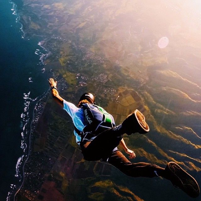 People in nature, Adventure, Extreme sport, Parachuting, Sunlight, Air sports, Outdoor shoe, Windsports, Exercise, Walking shoe, 