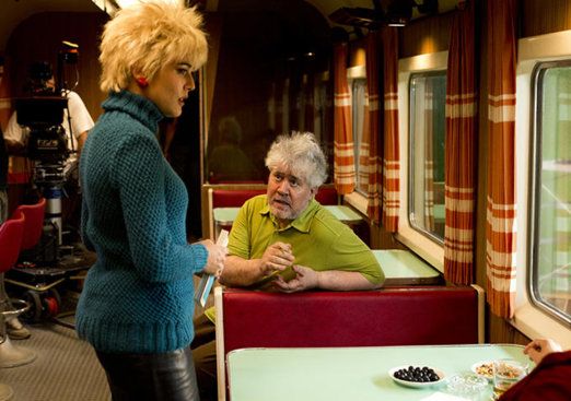 Public transport, Sweater, Train, Blond, Passenger, Rolling stock, Plate, Passenger car, Railway, Railroad car, 