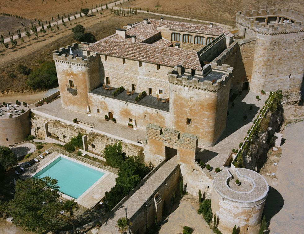Landscape, House, Arch, Palace, Medieval architecture, Estate, Fortification, Swimming pool, Aerial photography, Historic site, 