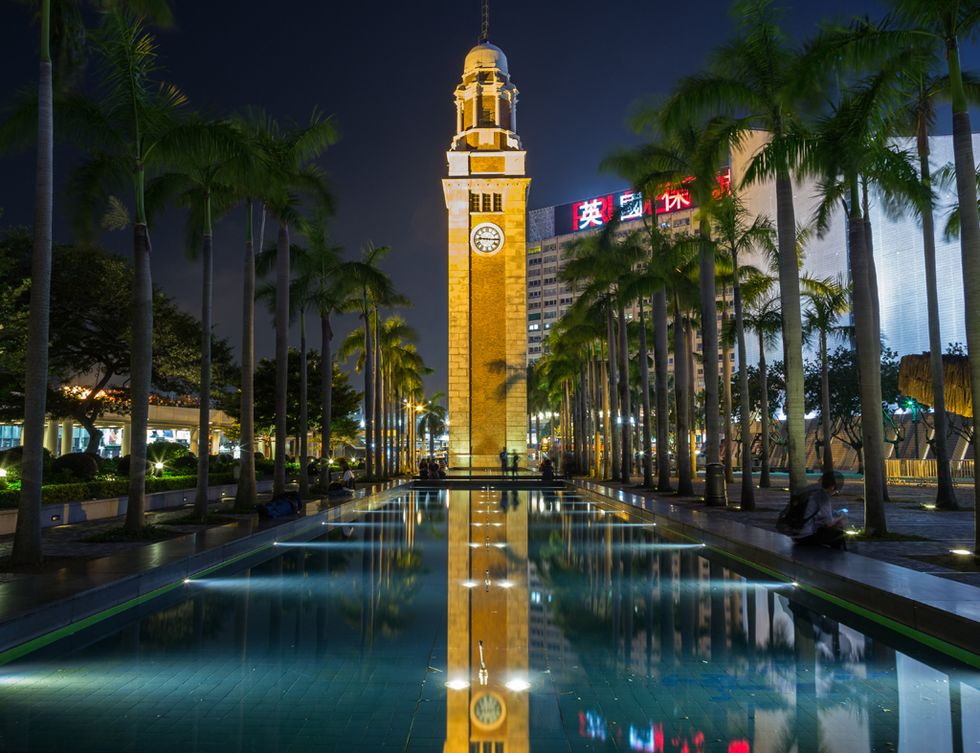 Reflection, Tower, Clock tower, Night, Arecales, Landmark, Majorelle blue, Flowering plant, Reflecting pool, Water feature, 