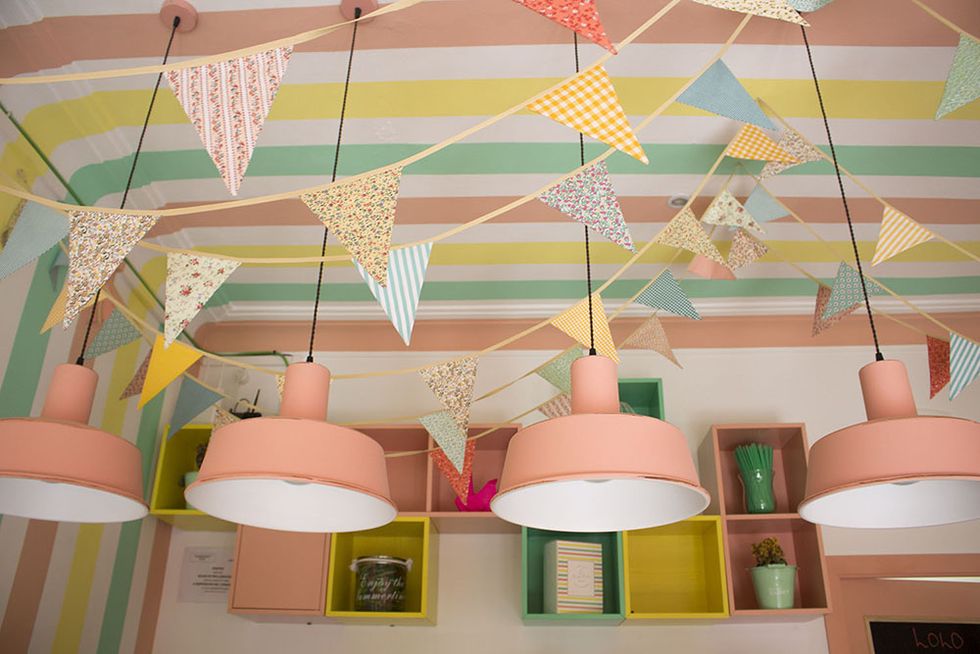 Interior design, Orange, Lighting accessory, Wall, Ceiling, Lampshade, Peach, Teal, Turquoise, Home accessories, 