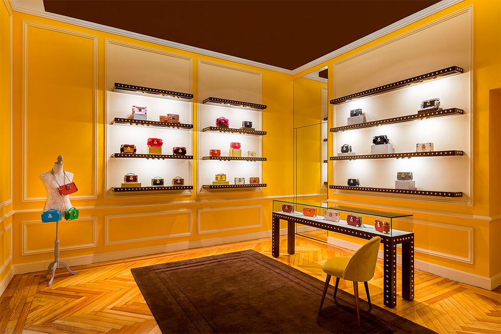 Interior design, Yellow, Room, Building, Furniture, Display case, Wall, Architecture, Design, Ceiling, 