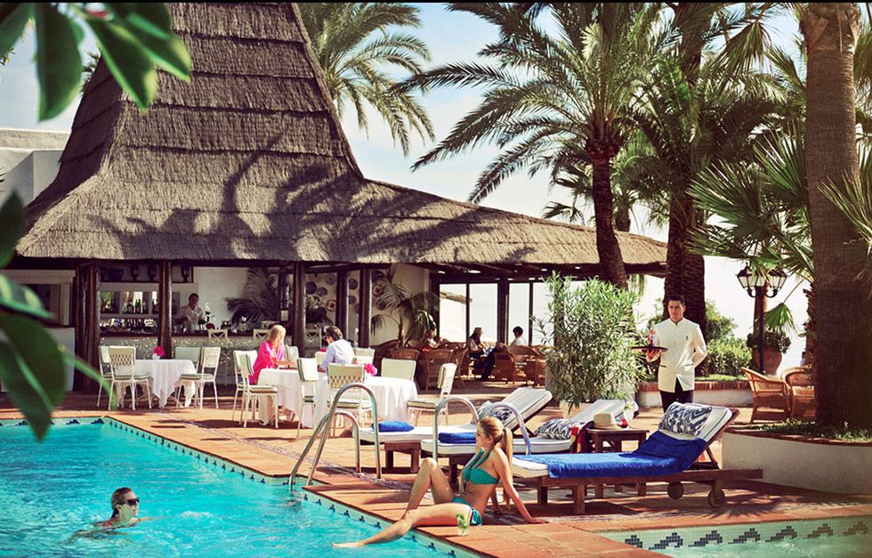 Swimming pool, Leisure, Resort, Outdoor furniture, Sunlounger, Vacation, Arecales, Thatching, Shade, Roof, 