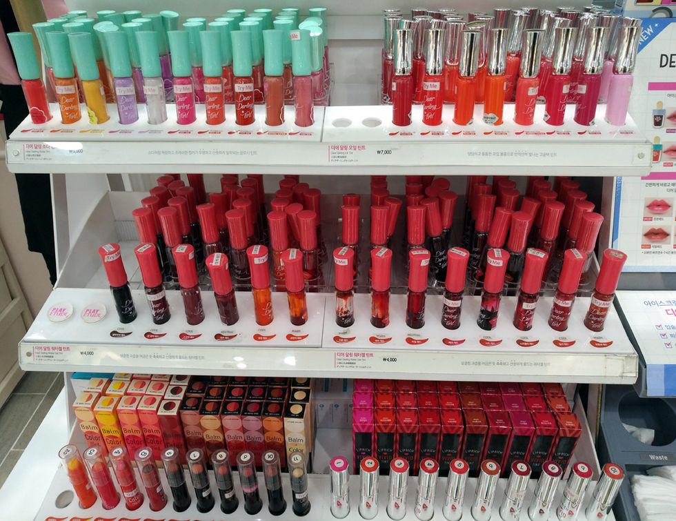 Red, Cosmetics, Nail polish, Nail care, Material property, Soft drink, Shelf, 