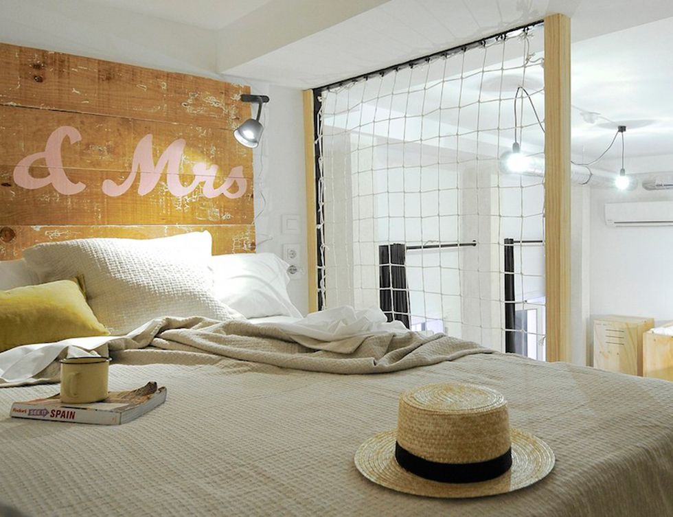 Room, Hat, Interior design, Bed, Property, Textile, Wall, Bedding, Floor, Bedroom, 