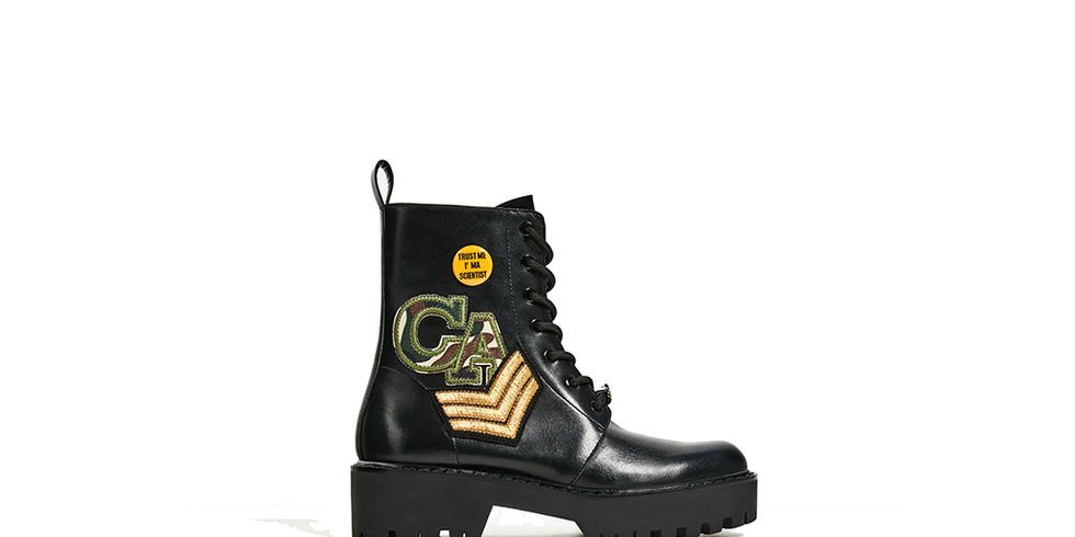 Footwear, Product, Boot, Logo, Black, Costume accessory, Brand, Steel-toe boot, Work boots, Leather, 