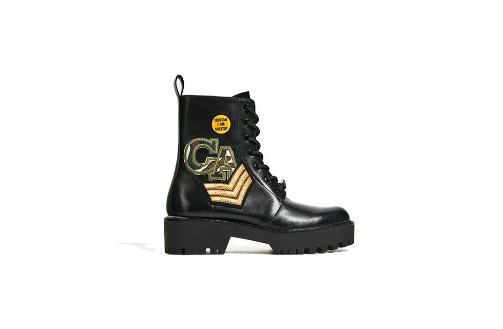 Footwear, Product, Boot, Logo, Black, Costume accessory, Brand, Steel-toe boot, Work boots, Leather, 
