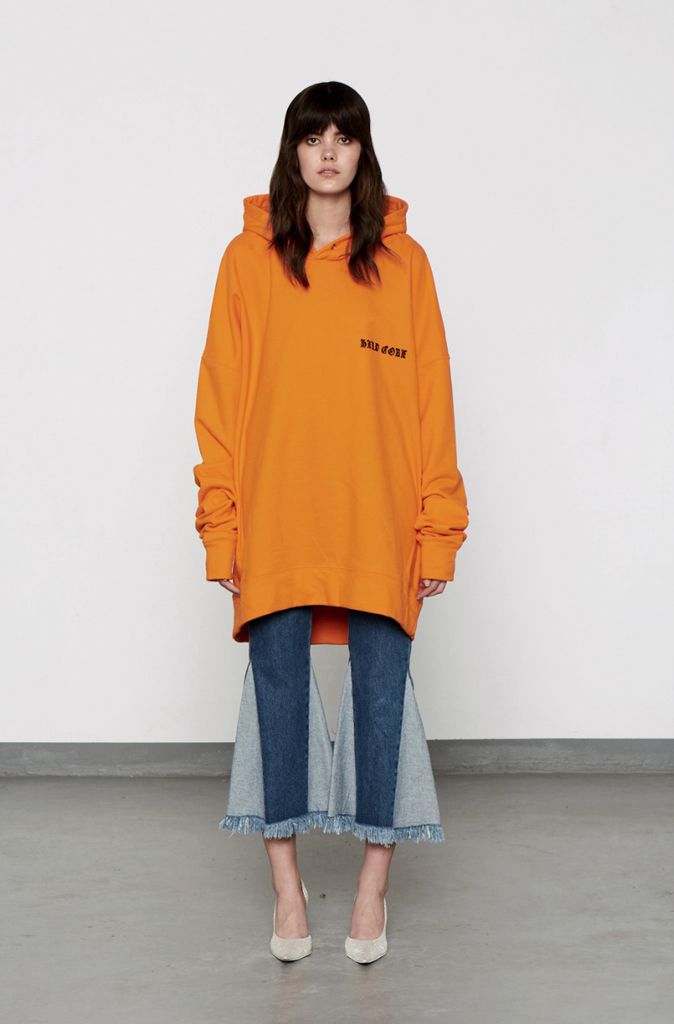 Clothing, Sleeve, Shoulder, Textile, Joint, Outerwear, Standing, Style, Orange, Street fashion, 