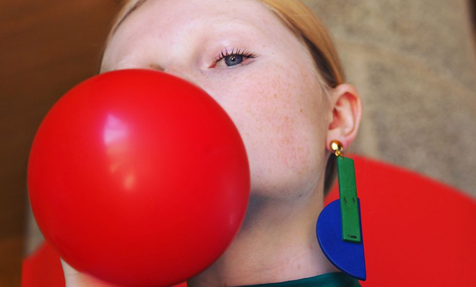Red, Nose, Head, Balloon, Cheek, Joint, Chewing gum, Neck, Ball, Smile, 