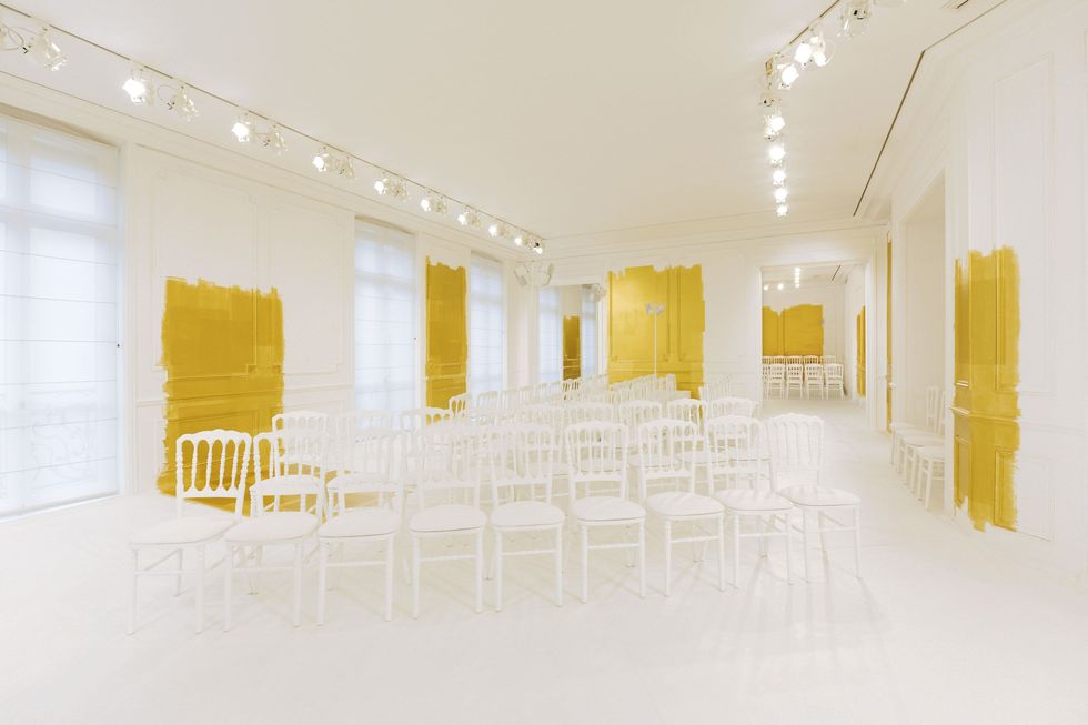 Yellow, Property, Interior design, Room, Ceiling, Hall, Floor, Amber, Light fixture, Interior design, 