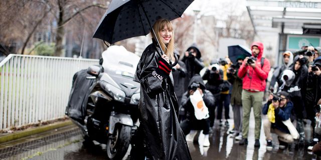 Rain, Umbrella, Street fashion, Water, Precipitation, Event, Pedestrian, Fashion accessory, Costume, Street, 