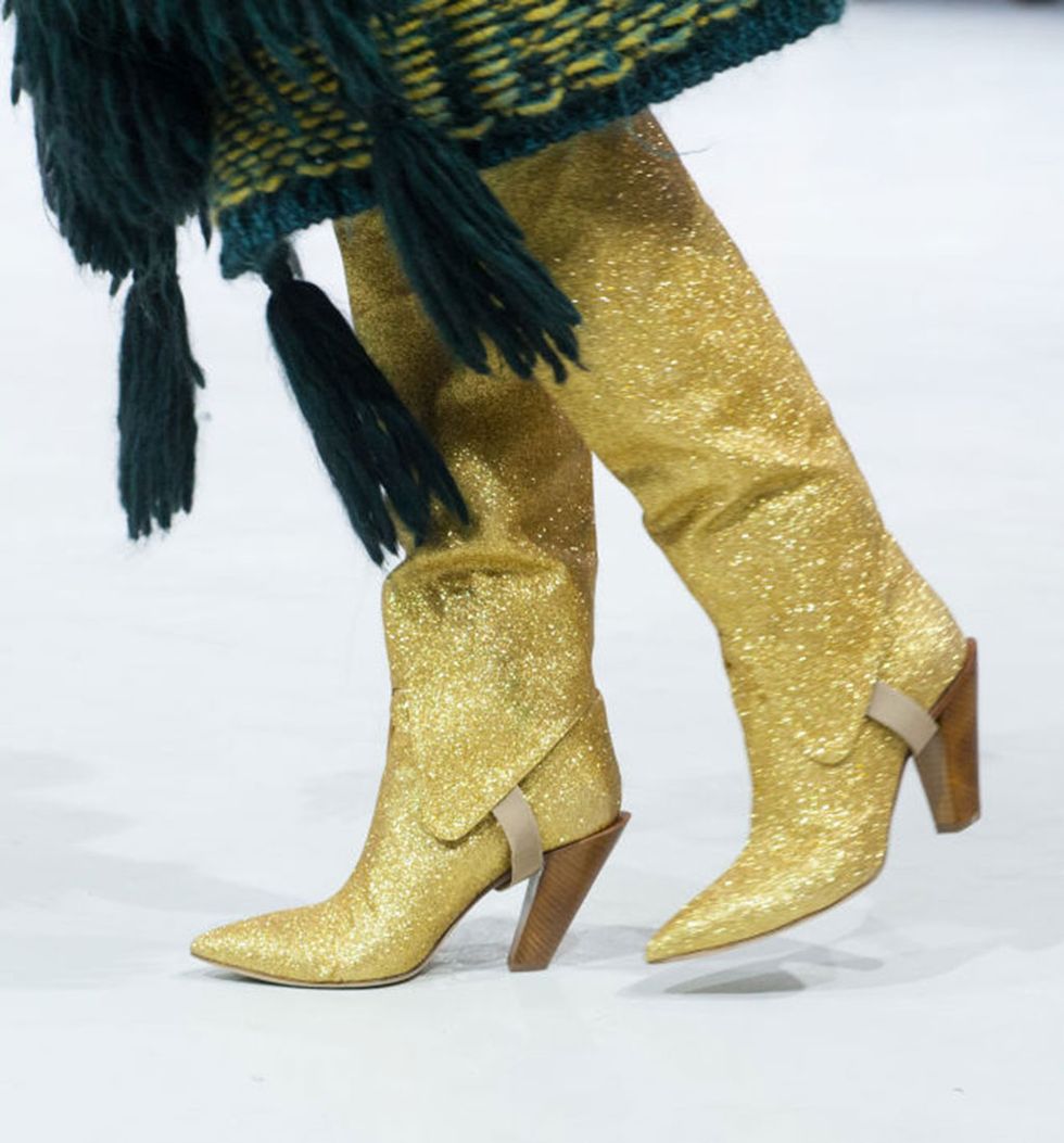 Yellow, Human leg, Joint, Tan, Metal, Natural material, Foot, Calf, Ankle, High heels, 