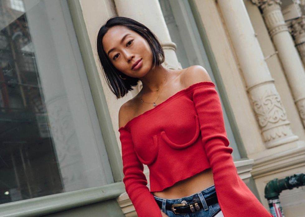 Clothing, Shoulder, Waist, Red, Street fashion, Joint, Beauty, Crop top, Fashion, Sleeve, 