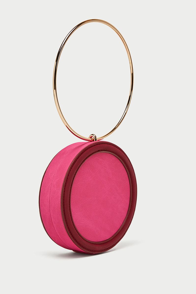 Pink, Magenta, Fashion accessory, Circle, Material property, Oval, Jewellery, Makeup mirror, Pendant, Peach, 