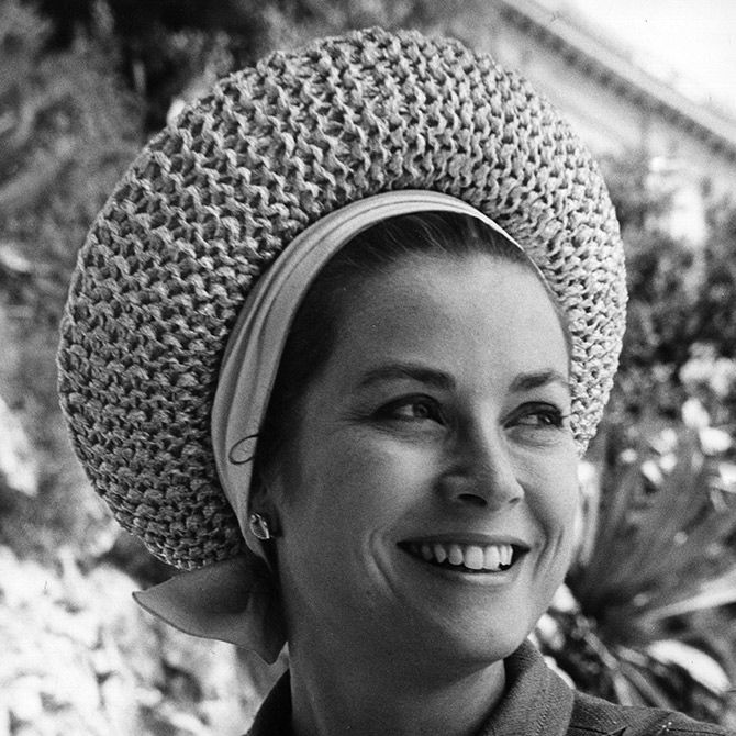 Facial expression, People, Smile, Headgear, Black-and-white, Monochrome, Stock photography, Photography, Bonnet, Fashion accessory, 