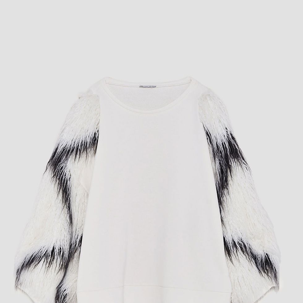 White, Clothing, Fur, Sleeve, Outerwear, Textile, Neck, Black-and-white, Top, Feather, 