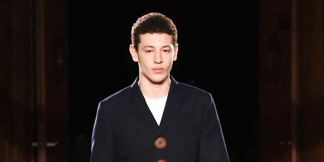 Sleeve, Collar, Human body, Outerwear, Standing, Fashion show, Formal wear, Style, Coat, Floor, 