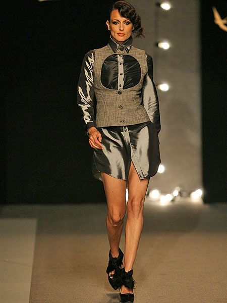 Clothing, Fashion show, Shoulder, Human leg, Runway, Joint, Outerwear, Fashion model, Style, Knee, 