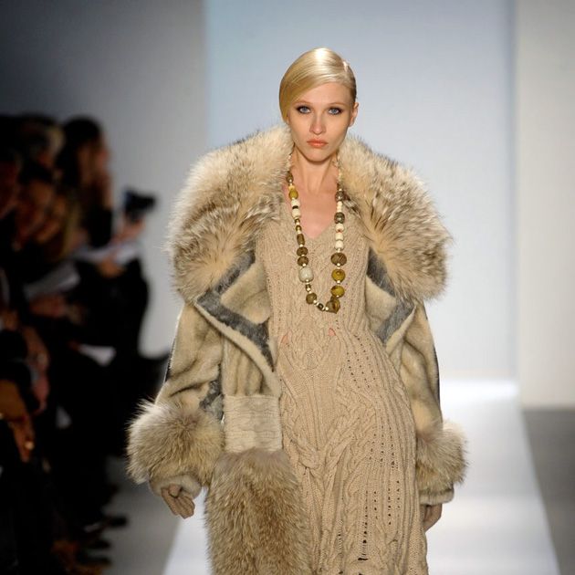 Clothing, Fashion show, Skin, Shoulder, Runway, Textile, Joint, Outerwear, Fashion model, Fur clothing, 