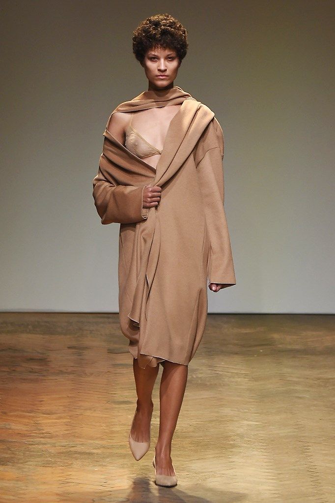 Brown, Hairstyle, Sleeve, Shoulder, Fashion show, Joint, Style, Floor, Runway, Flooring, 