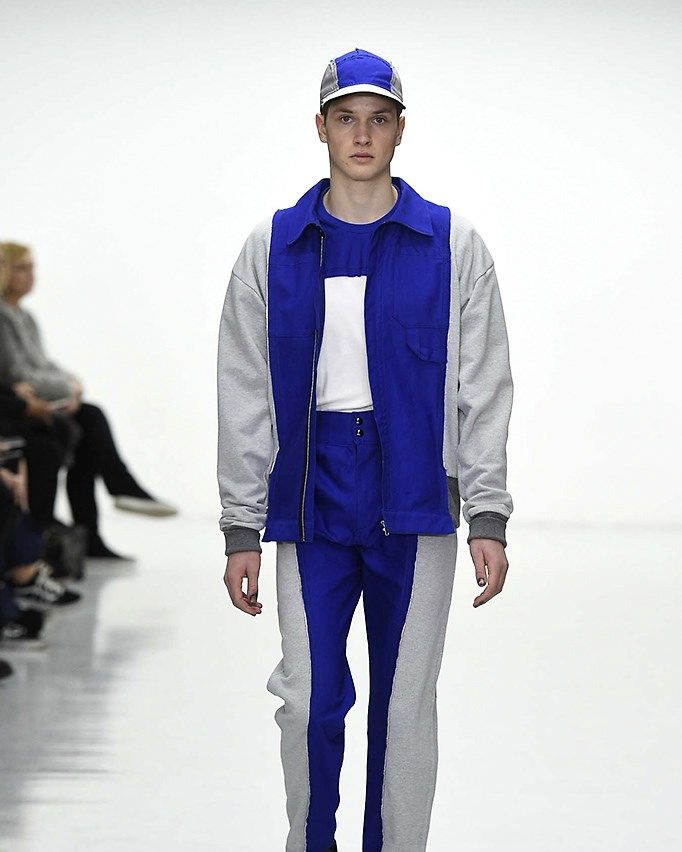 Blue, Sleeve, Trousers, Cap, Standing, Textile, Jacket, Joint, Style, Electric blue, 