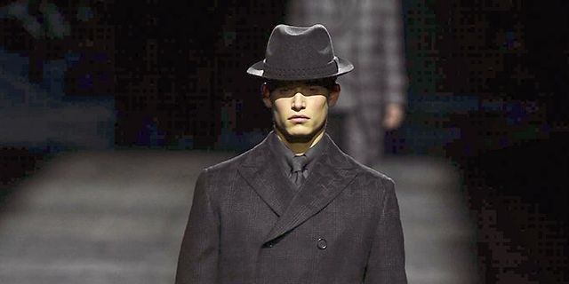 Sleeve, Human body, Collar, Hat, Coat, Standing, Outerwear, Formal wear, Style, Blazer, 