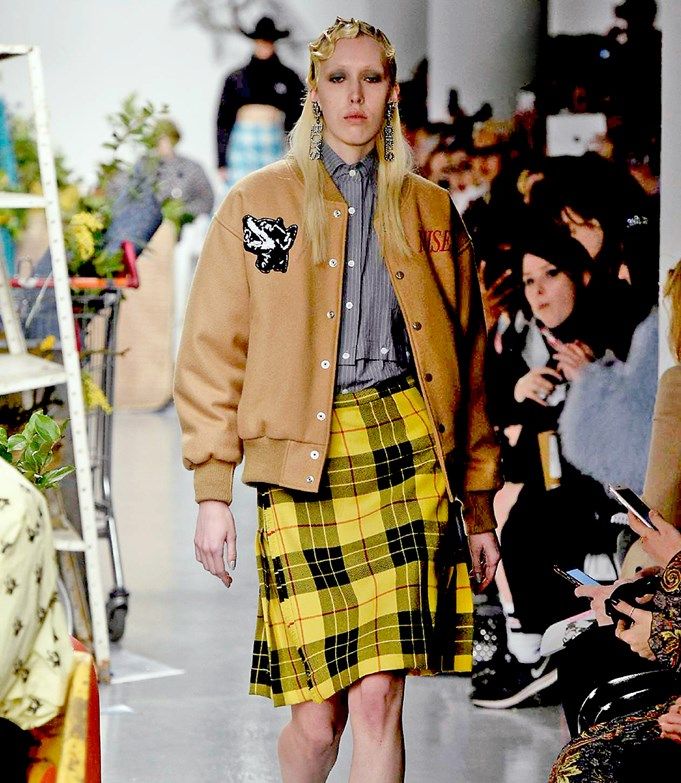 Clothing, Fashion show, Event, Flag, Outerwear, Runway, Plaid, Style, Coat, Fashion model, 