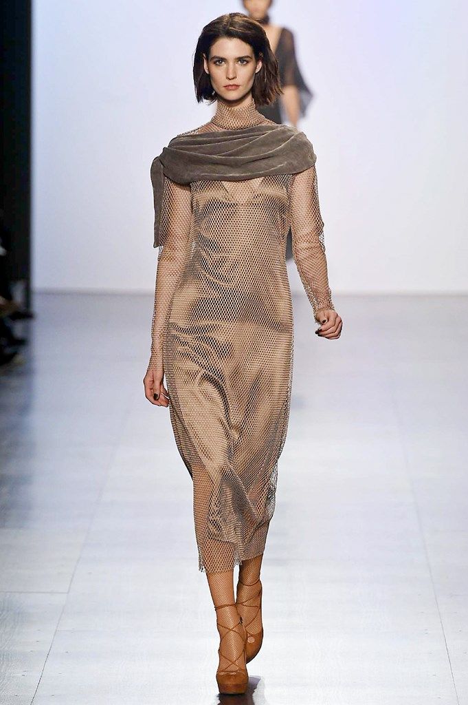 Fashion show, Brown, Skin, Shoulder, Joint, Runway, Fashion model, Style, Waist, Fashion, 