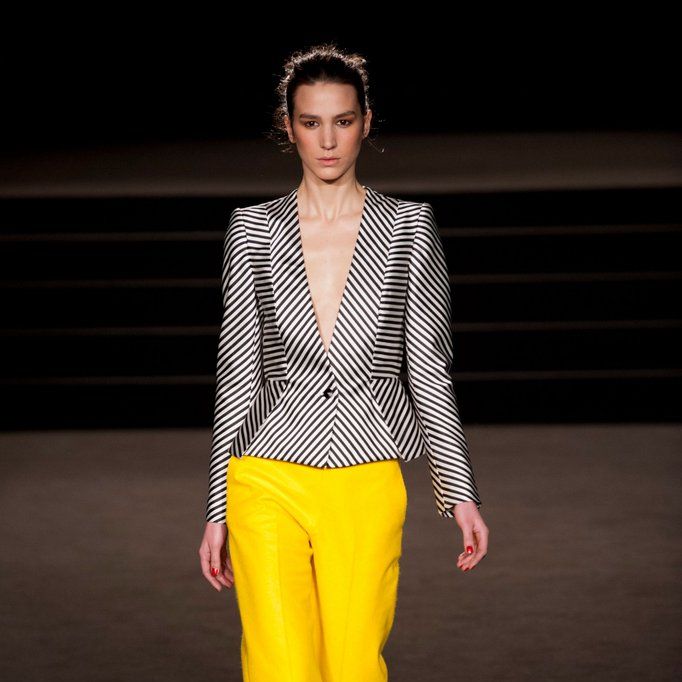 Clothing, Yellow, Sleeve, Trousers, Fashion show, Shoulder, Outerwear, Style, Waist, Runway, 