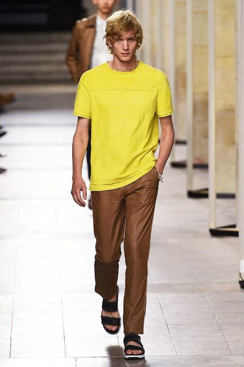 Brown, Yellow, Sleeve, Trousers, Shoulder, Shirt, Joint, Standing, T-shirt, Style, 