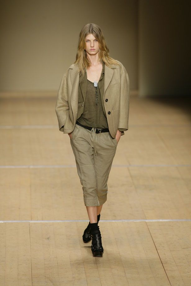 Clothing, Brown, Sleeve, Shoulder, Khaki, Fashion show, Joint, Outerwear, Style, Knee, 