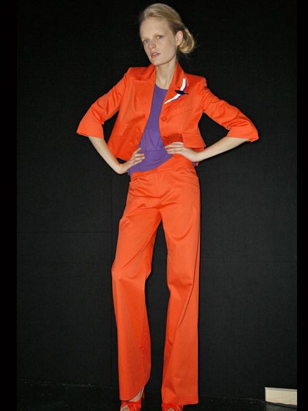 Sleeve, Collar, Standing, Suit trousers, Orange, Pantsuit, Blond, Pocket, Fashion design, Stage, 