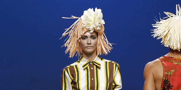 Clothing, Yellow, Hairstyle, Shoulder, Style, Dress, Costume design, Fashion model, Headgear, Costume accessory, 