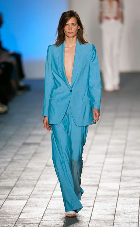 Blue, Fashion show, Shoulder, Joint, Outerwear, Fashion model, Style, Runway, Fashion, Neck, 