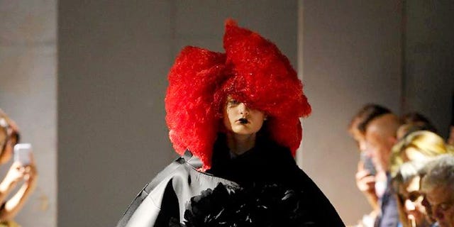 Headgear, Costume accessory, Fashion, Costume design, Hair accessory, Wig, Costume, Fashion model, Fur, Fashion show, 