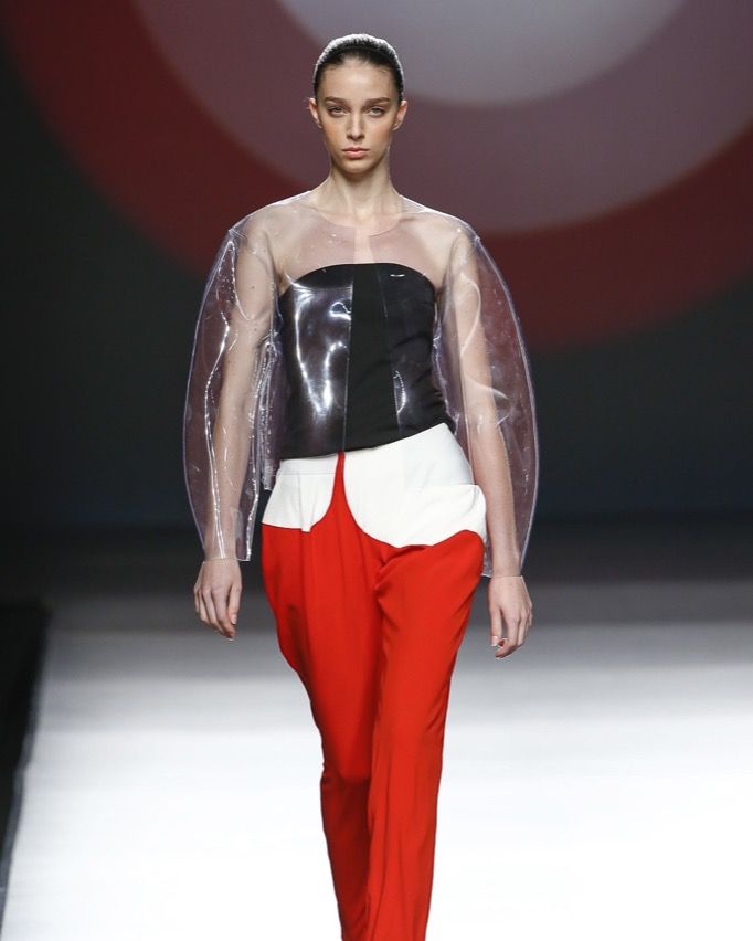 Human body, Fashion show, Shoulder, Textile, Joint, Red, Runway, Fashion model, Style, Waist, 