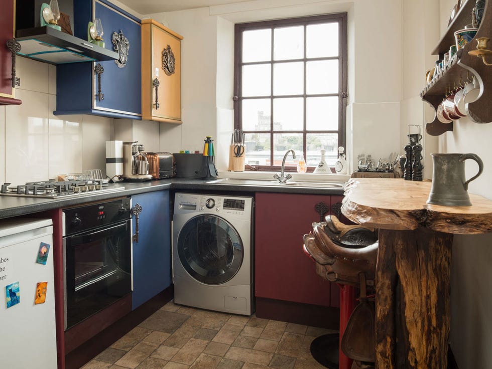 Room, Countertop, Property, Kitchen, Major appliance, Cabinetry, Furniture, Laundry room, Floor, Interior design, 