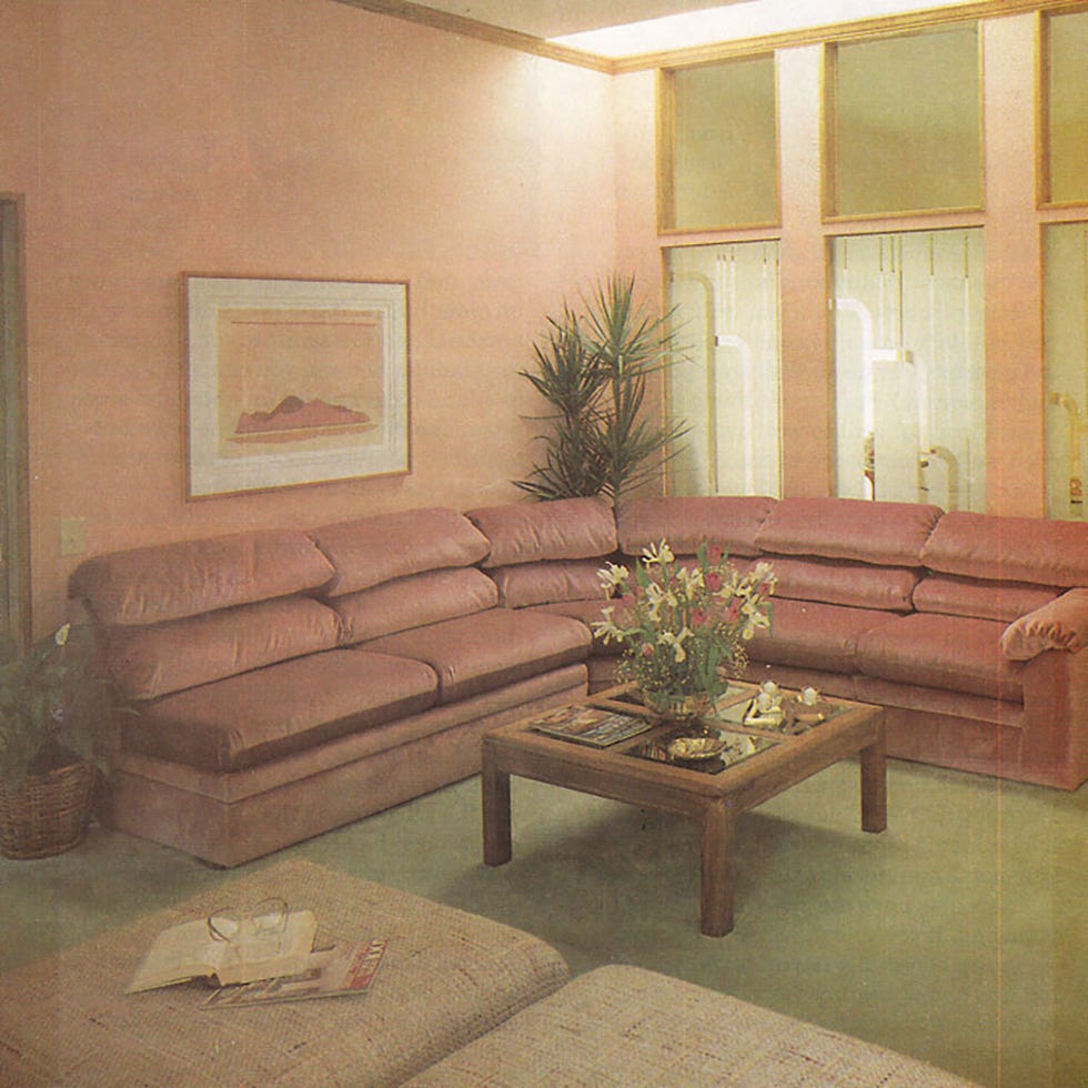 Furniture, Room, Living room, Couch, Interior design, Coffee table, Wall, Table, Floor, Waiting room, 