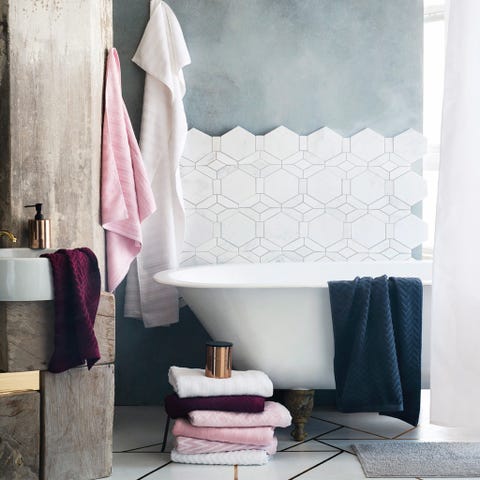 Room, Interior design, Textile, Wall, Linens, Purple, Floor, Towel, Fixture, Shower curtain, 