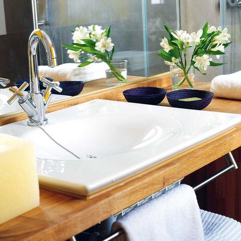 Glass, Plumbing fixture, Tap, Sink, Interior design, Plumbing, Bathroom sink, Ceramic, Bouquet, Porcelain, 