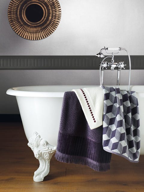 Textile, Room, Floor, Clothes hanger, Interior design, Linens, Flooring, Purple, Household supply, Home accessories, 