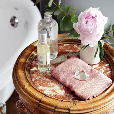 Petal, Pink, Liquid, Purple, Home accessories, Bottle, Linens, Centrepiece, Flowering plant, Glass bottle, 