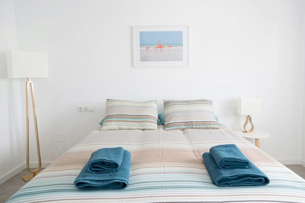 Room, Wood, Bedding, Textile, Bedroom, Wall, Bed sheet, Bed, Linens, Interior design, 