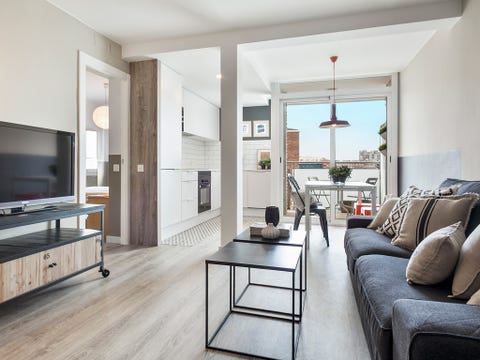 Wood, Room, Interior design, Floor, Living room, Property, Television set, Display device, Table, Wall, 