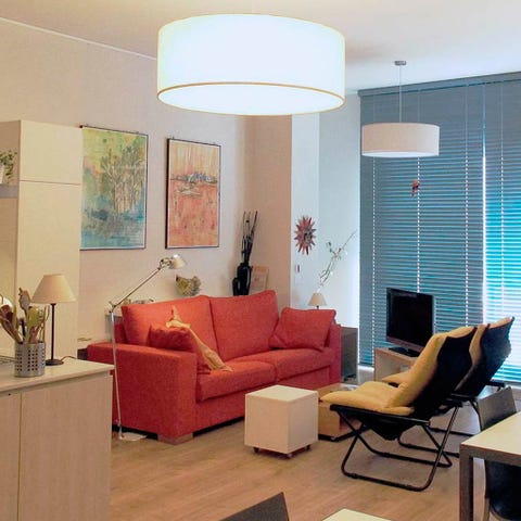 Living room, Furniture, Room, Interior design, Ceiling, Property, Lighting, Floor, Building, Yellow, 