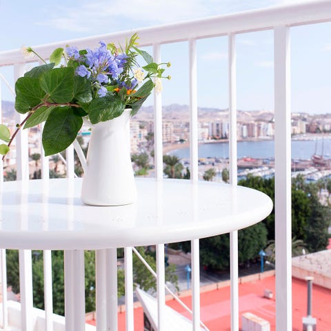 Glass, Flower, Table, Real estate, Petal, Flowerpot, Outdoor table, Vase, Cut flowers, Flower Arranging, 