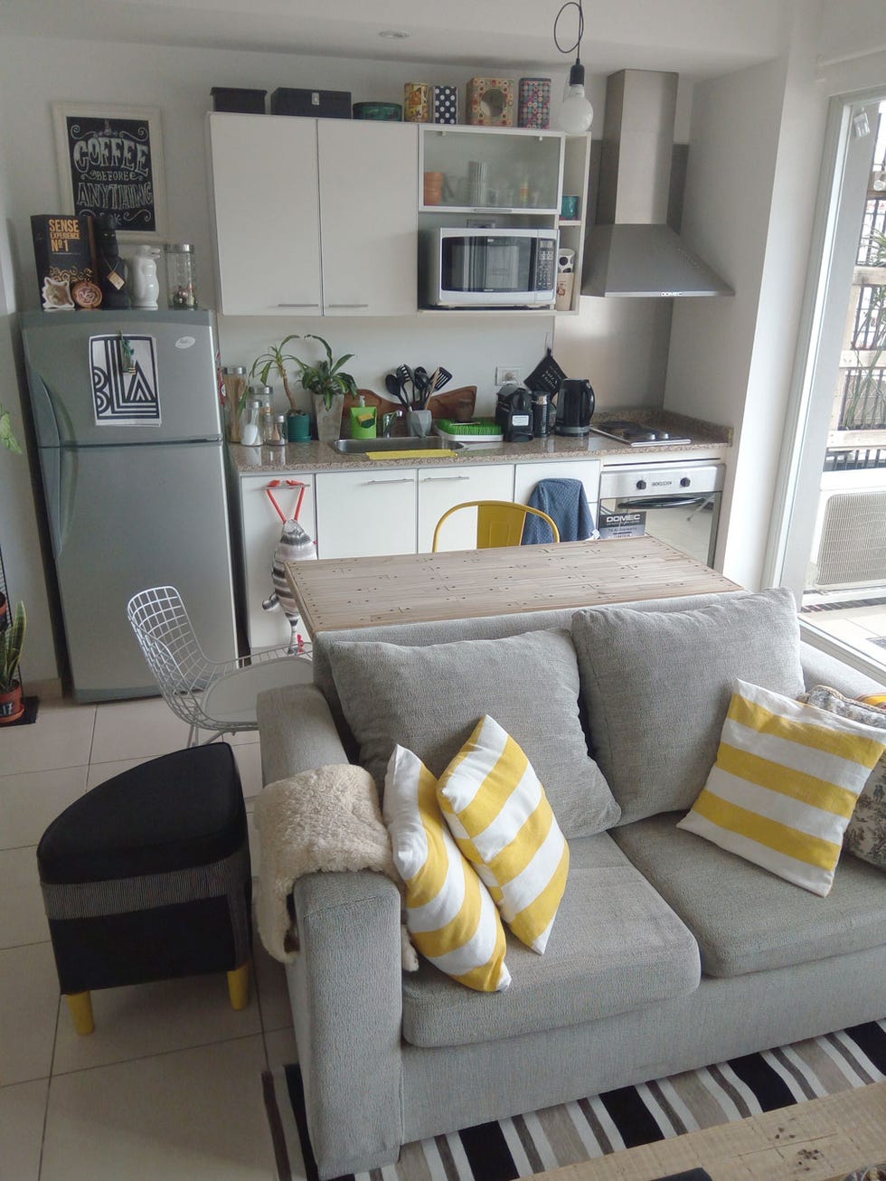 Room, Living room, Furniture, Property, Interior design, Yellow, Home, House, Floor, Table, 