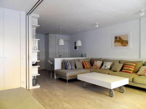 Wood, Floor, Room, Interior design, Flooring, Property, Wall, Furniture, Couch, Hardwood, 